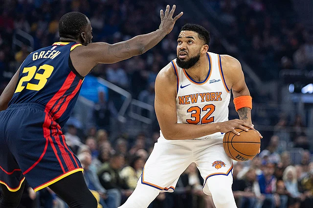 NBA 2024-25: Warriors forward Draymond Green (23) defends against Knicks center Karl-Anthony Towns | Photo: AP/Benjamin Fanjoy